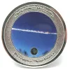 This is a picture of a limited edition coin which commemorates the Chelyabinsk impact. The coin also contains a small piece of that meteorite.