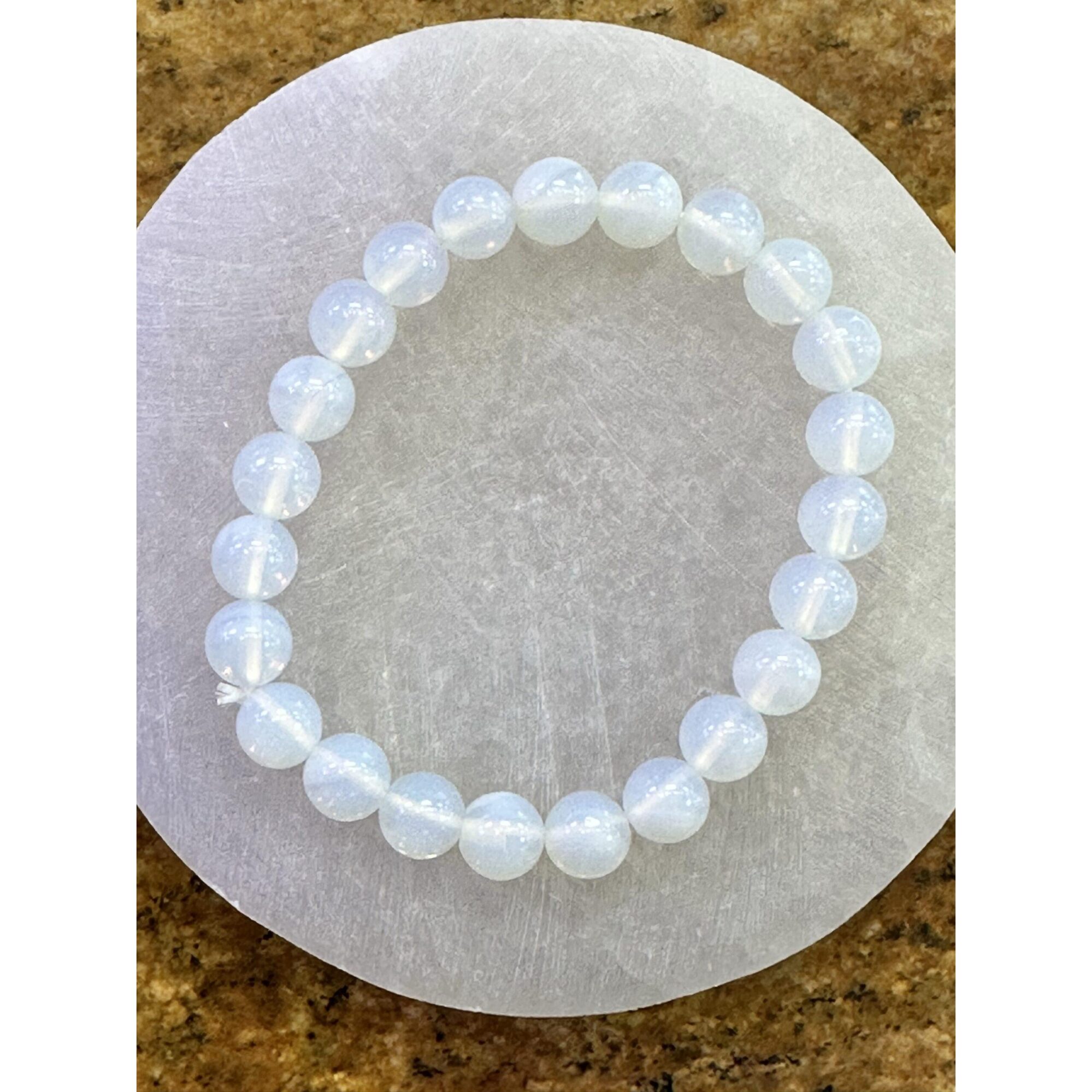 Metaphysical bracelet, Opalite beads Prehistoric Online