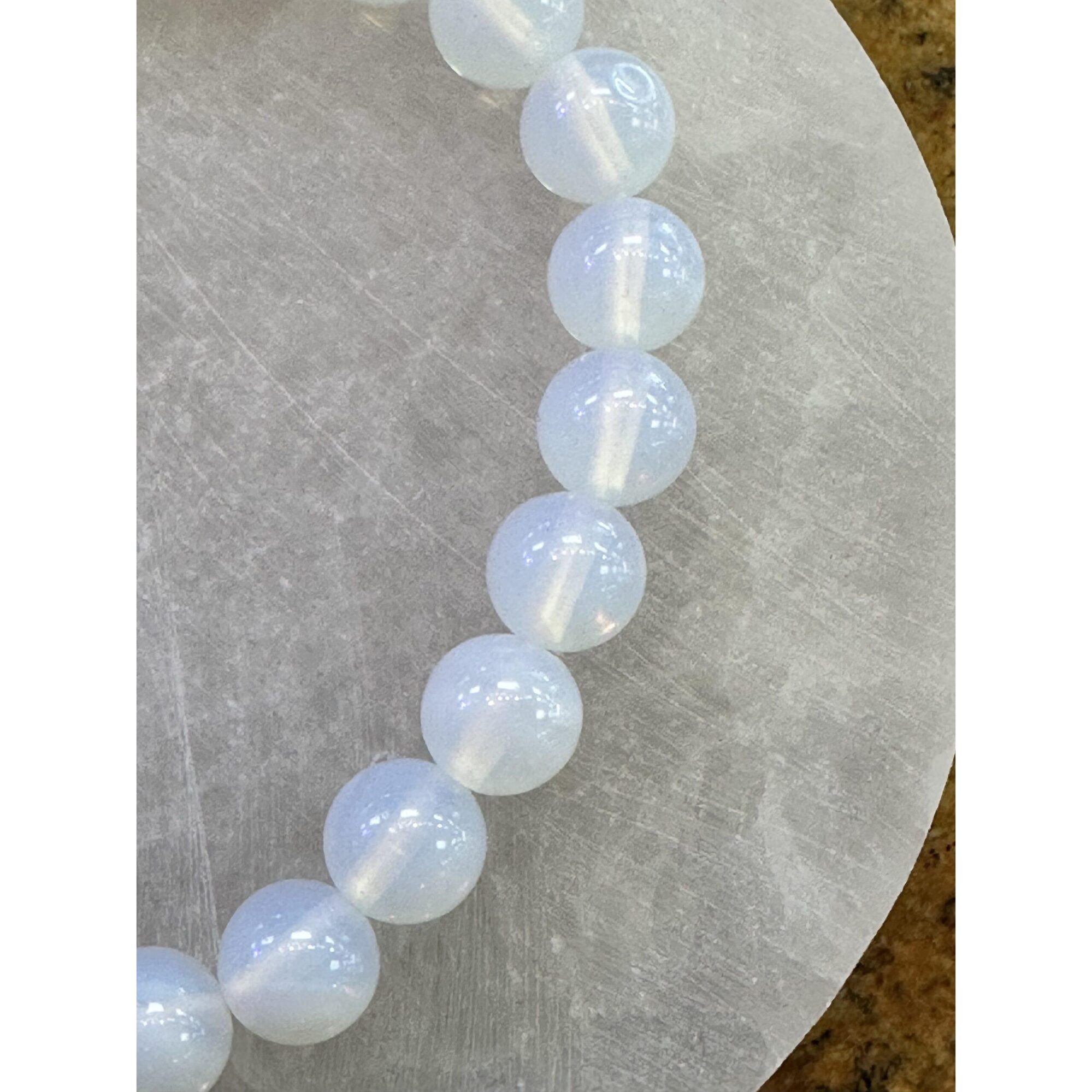 Metaphysical bracelet, Opalite beads Prehistoric Online