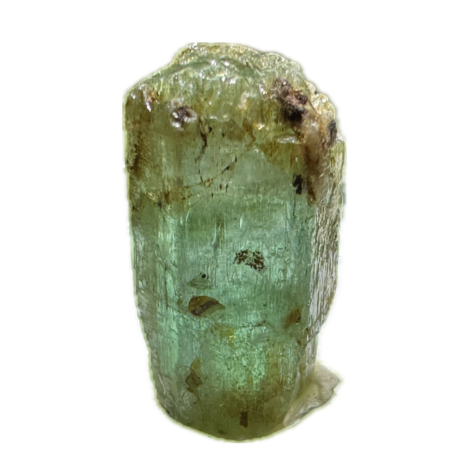 This picture shows a thumbnail-size emerald of a light lime color